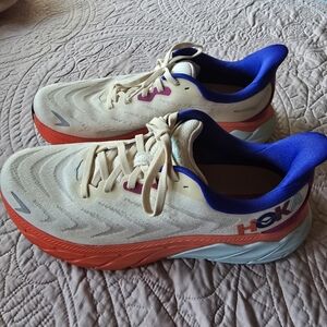 HOKA running Shoes. Like New. Cream With Blue And Orange Accent Colors. Size 9B